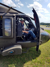 Joe Stogner seated in a "Blank Type" Helicopter